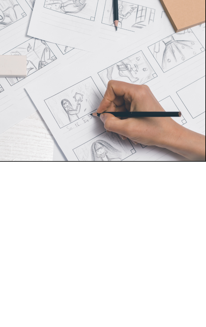 hand holding a pencil and sketching in comic book panels 