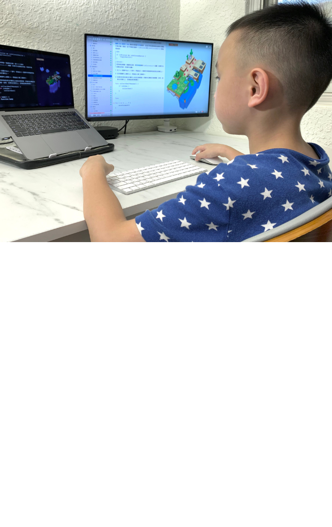 child coding with two devices